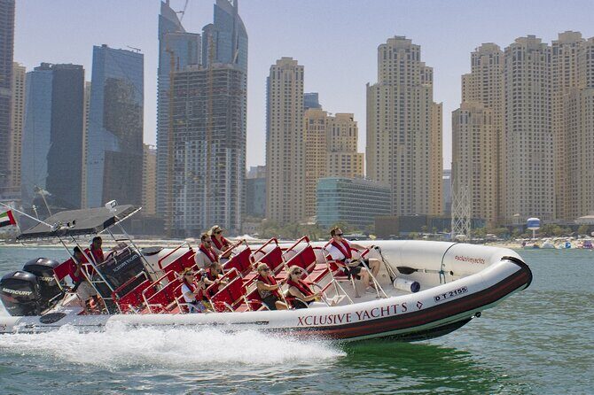 90 Minutes Speedboat Tour: Marina, Atlantis, Palm & Burj Al Arab - Palm Jumeirah from the water: tree-shaped island, luxury edges, and long views
