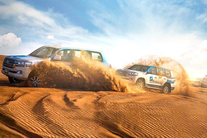 Abu Dhabi: Desert Safari with BBQ, Camel Ride & Sandboarding - Al Khatim Desert: camel farm, dune bashing, and photo stops