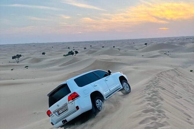 Abu Dhabi: Evening Desert Safari with Camel Ride, BBQ & Live Show - Getting Picked Up in an AC Jeep: What the Ride Feels Like