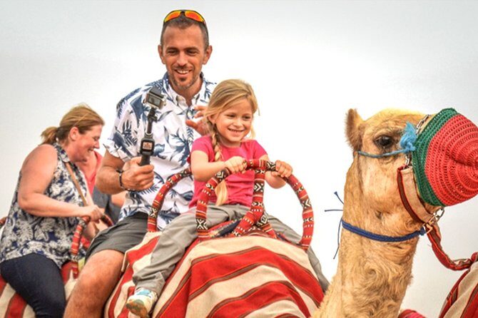 Abu Dhabi: Morning Desert Safari with Camels and Sandboarding - Sandboarding on the Dunes: Fun, Quick, and a Shoe Reminder