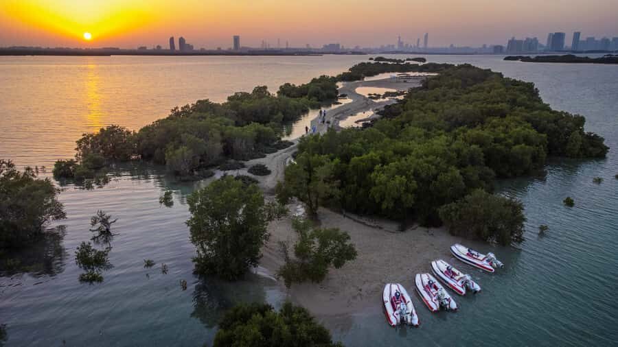 Abu Dhabi: Yas Island Self-Driving Guided Speedboat Tour - Ferrari World backdrop and Yas Links Golf views