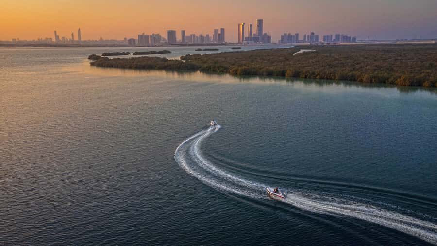 Abu Dhabi: Yas Island Self-Driving Guided Speedboat Tour - Aldar Headquarters and Al Raha Creek: modern city views from the water