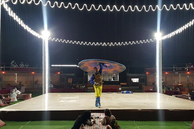 Desert Safari Dubai (Pickup and Drop by 4x4 Optional) - Live entertainment after dark: belly dance, Tanura, and fire show