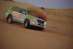 Desert Safari Tour, Quad Bike with BBQ Dinner & Show from Dubai - Hotel pickup, Land Cruiser comfort, and leaving the city