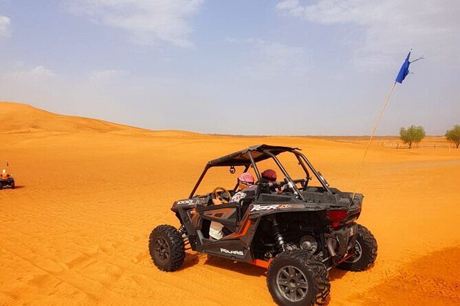 Desert Safari With BBQ Dinner, Quad Bike & Camel Ride from Dubai - Camel ride, traditional attire, and falcon photos without the fuss
