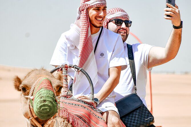 Desert Safari With BBQ Dinner, Quad Bike & Camel Ride from Dubai - Dubai pickup and the Land Cruiser ride: the easy part you’ll appreciate