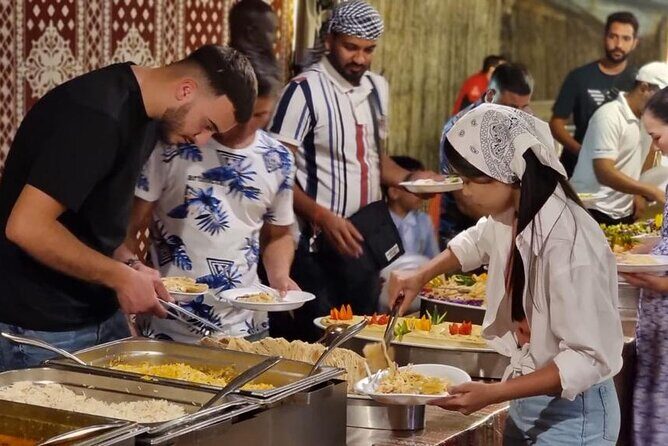 Desert Safari with Dune Bashing and Dinner In Dubai - Desert Camp Time: Camel Riding and Starlit Breaks
