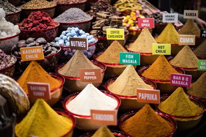 Dubai Aladdin Tour: Souks, Creek, Old Dubai and Tastings - Souks Time: How to Haggle Without Getting Steamrolled