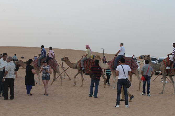 Dubai: Buggy Dune Bashing, Sand Boarding, Camel Ride & Show - Pickup, timing, and what 4–7 hours really feels like