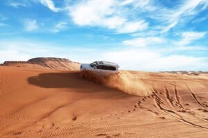 Dubai Desert Bespoke: Red Dunes Safari, Camel Ride & BBQ Options - Hotel Pickup to Lahbab: The 50-Minute 4x4 Desert Drive That Sets the Mood