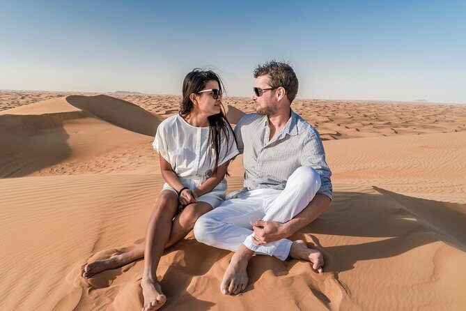 Dubai Desert Discovery: Red Dunes Safari, Sandboard & Camel Ride - Pickup, timing, and how the 4 hours play out