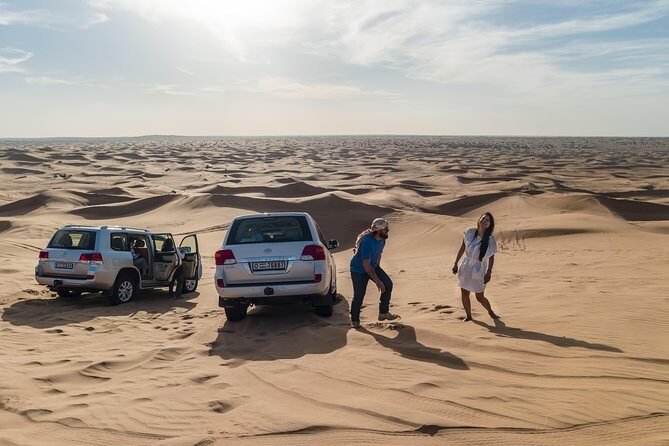 Dubai Desert Discovery: Red Dunes Safari, Sandboard & Camel Ride - Camel ride and sandboarding: fun, but manage expectations
