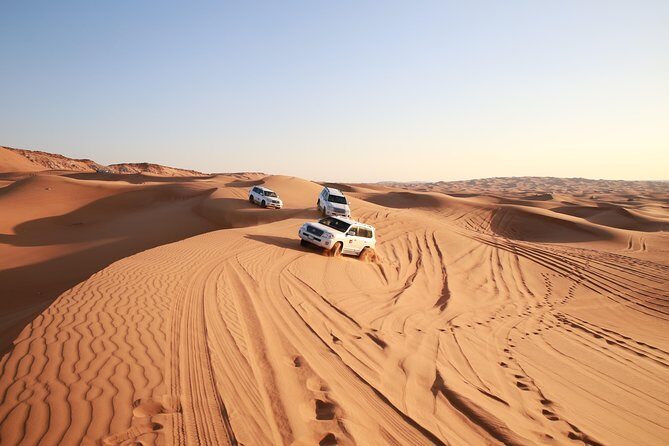 Dubai Desert Discovery: Red Dunes Safari, Sandboard & Camel Ride - Quad biking upgrade: optional, risky, and age-limited