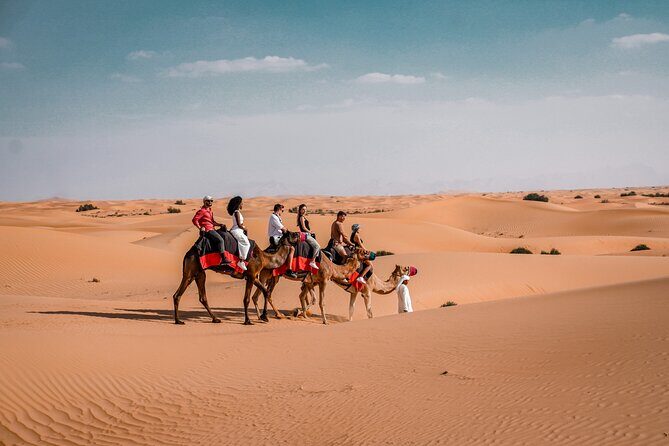 Dubai Desert Safari: Camel Ride, Sandboarding, BBQ & House Drinks - Dinner and Unlimited Drinks Under Desert Stars