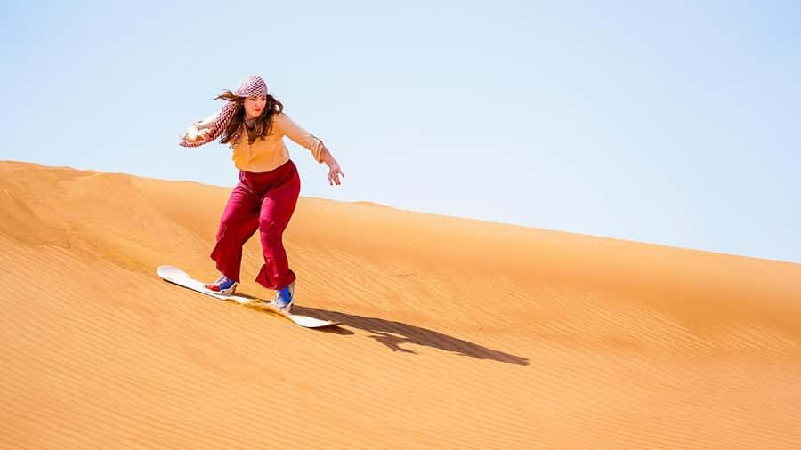 Dubai: Desert Safari, Camel Ride, Sandboarding, Quad Bike - Camel Ride and Sandboarding: Old Desert Traditions Meet Instant Adrenaline