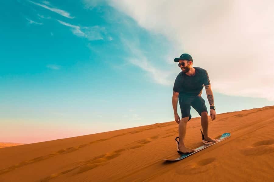 Dubai: Desert Safari, Quad Bike, Sandboarding, Camels & BBQ - First Stop: Pickup, Tire Pressure, and Falcons Before the Chaos