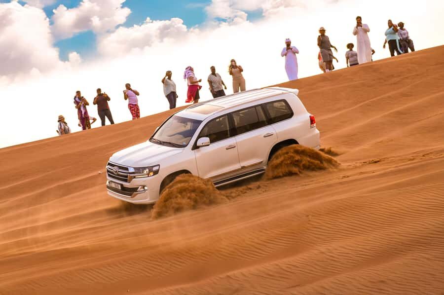 Dubai: Desert Safari with BBQ Dinner & Quad Biking Options - Pickup in Dubai, Sharjah, or Ajman: 4x4 comfort and timing