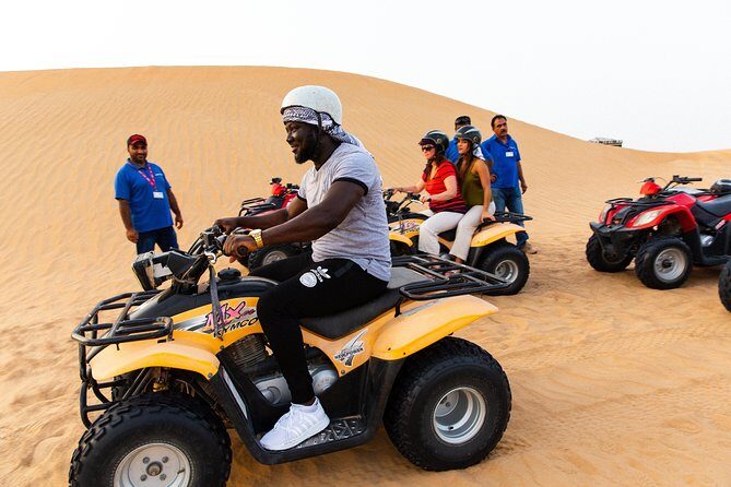 Dubai Desert Safari with Quads, BBQ Dinner, Camel ride, & Shows - Quad bike ride in the desert: the adrenaline part (and the age rule)