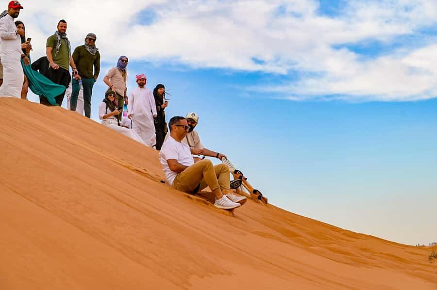 Dubai: Desert Safari with VIP BBQ and Optional Quad Bike - Dune Bashing, Sandboarding, and Camel Rides: The Core Experience