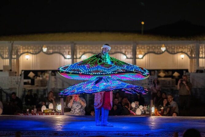 Dubai Dunes Safari With Quad Bike, Camel Ride, BBQ Dinner & Live Shows - BBQ dinner and live shows: belly dance, Tanura, and fire