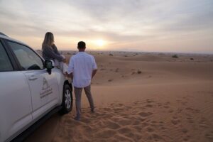 Dubai Evening Desert Safari: Sandboarding, BBQ, Camel Ride & more - Camel Ride, Sandboarding, and Henna: Where the Culture Turns Hands-On