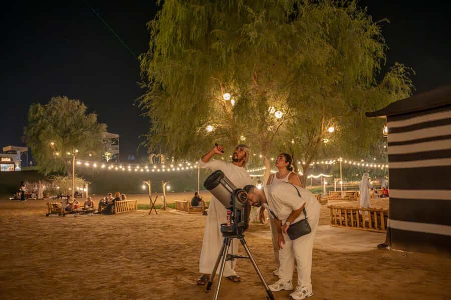 Dubai: Evening Desert Safari with Camel Ride & Stargazing - From hotel pickup to nightfall: the rhythm of the dune drive