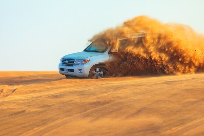 Dubai Evening Desert Safari With Transfers Dune Bashing & Dinner - Sandboarding and the optional quad/bike: what you can skip or add