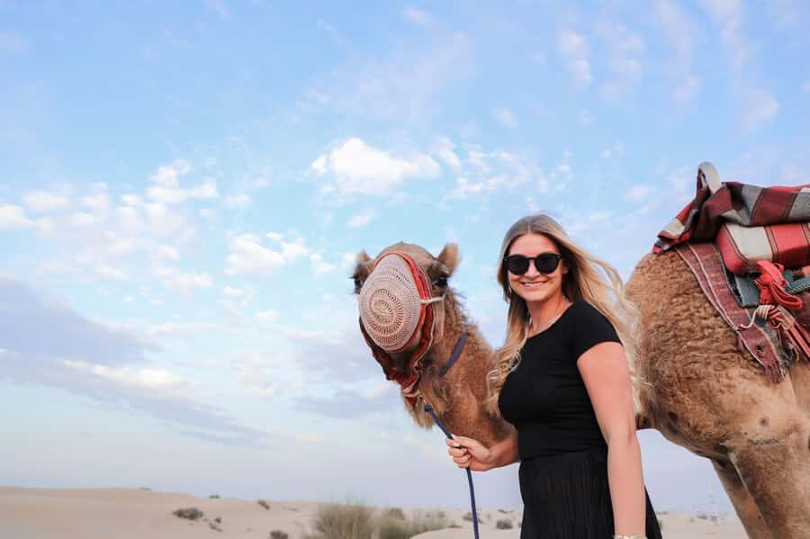 Dubai: Half-Day Desert Safari, Camel Ride, ATV & Dune Buggy - Sandboarding and falcon photos: the best “I can do this” adventure
