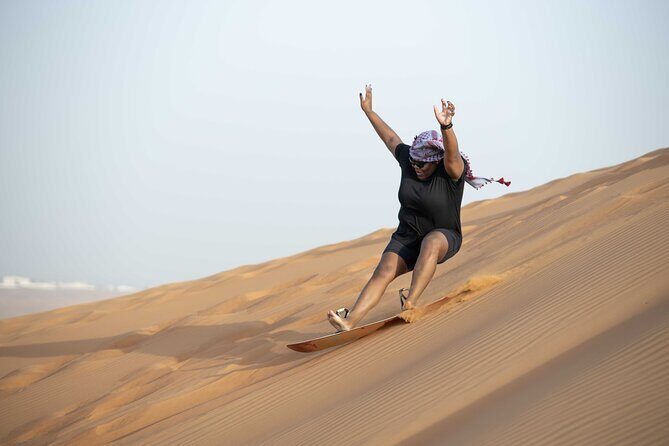 Dubai Half-day Red Dunes bashing with Sandboarding, Camel &Falcon - Camel Riding: Slow Pace, Traditional Feeling