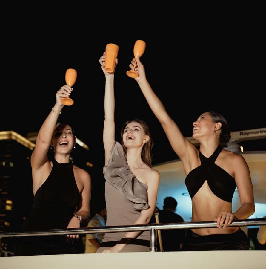 Dubai: Marina Yacht Party with BBQ, Unlimited Drinks and DJ - Entering Dubai Marina at Night: Where the Party Starts