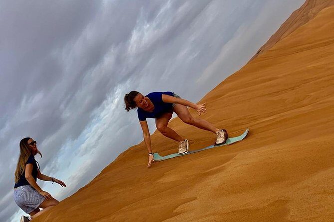 Dubai Morning Desert Safari with Quad Biking & More Activities - The camel ride and the desert photo stop: small moments with big mood