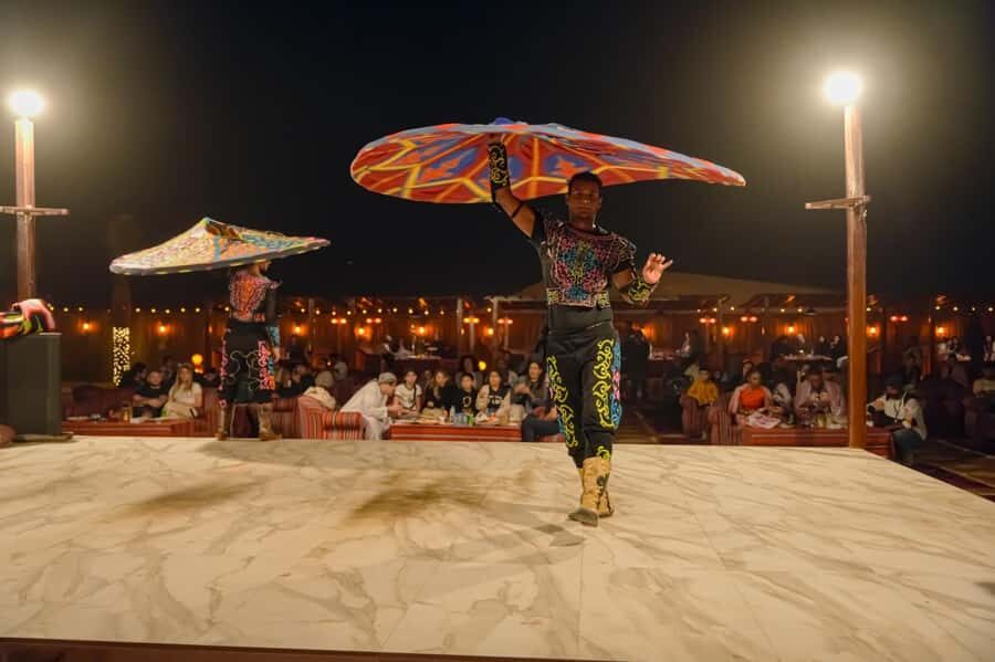 Dubai: Premium Red Dune Safari with Sandboarding & BBQ - Sandboarding and a desert photo stop at golden hour