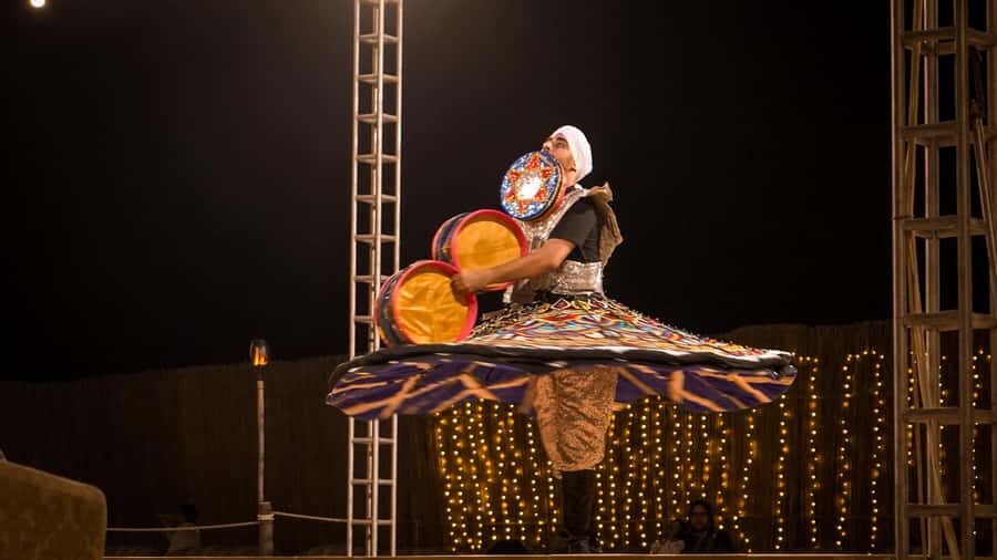 Dubai: Premium Red Dune Safari with Sandboarding & BBQ - Henna, sheesha, and the falcon photo question