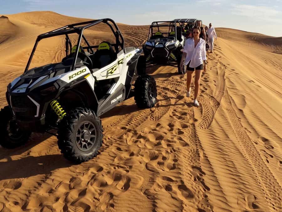 Dubai: Red Dune Desert, Dune Buggy Ride & BBQ Buffet Dinner - Sand Surfing and Camel Time: Short, Memorable Stops