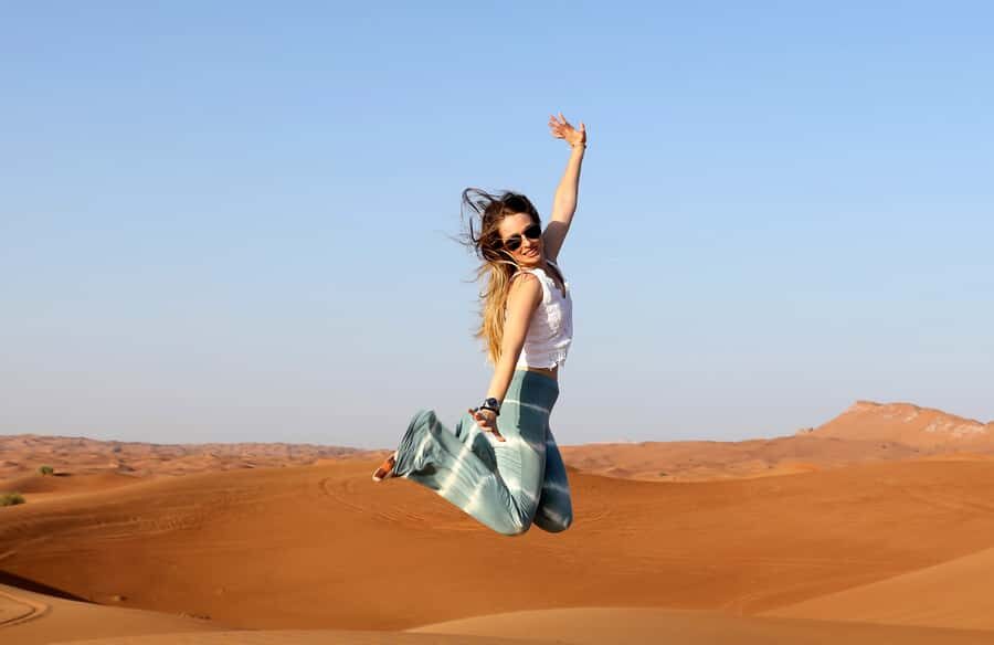 Dubai: Red Dune Desert Safari, Quad Bike, Camels, and BBQ - Camel Ride at Sunset: Slow Down, Catch the Best Photos