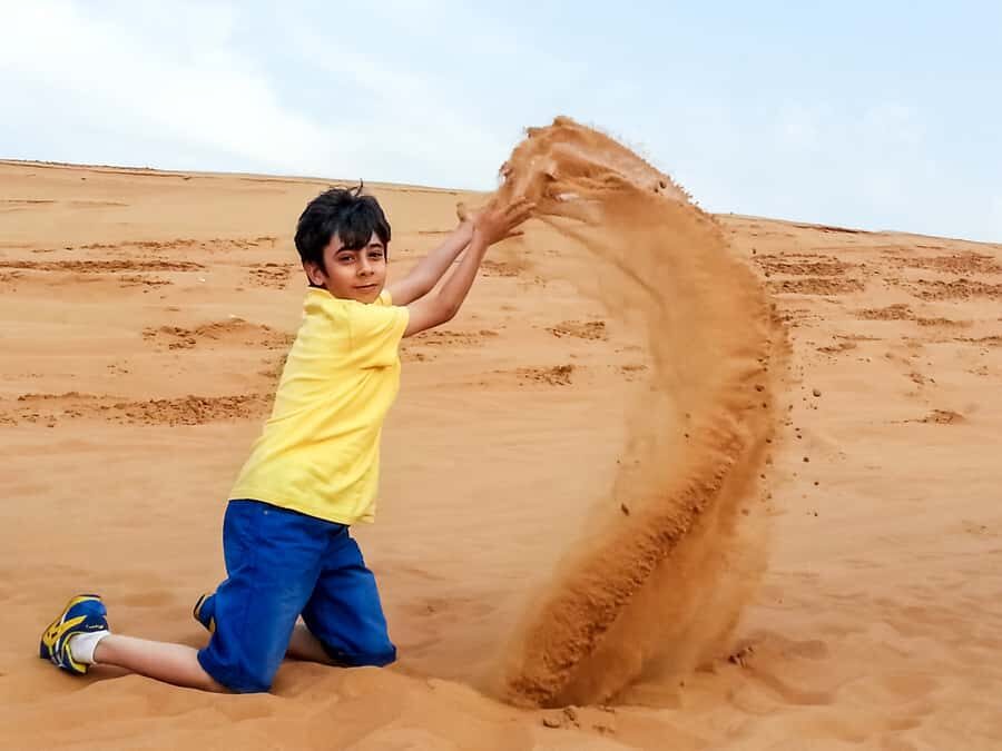 Dubai: Red Dune Safari, Quad Bike, Camel Ride, BBQ Dinner - Camel Ride and Bedouin Photo Moments at Golden Hour