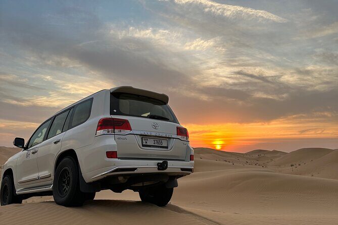 Dubai: Red Dunes, Sandsurf, Camel Ride, BBQ Dinner at Desert Camp - A 6-hour Dubai desert plan that’s built around sunset
