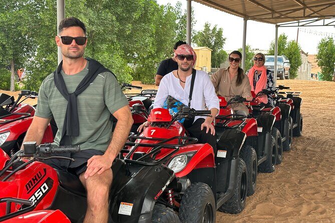 Dubai: Red Dunes, Sandsurf, Camel Ride, BBQ Dinner at Desert Camp - Camel ride and sandboarding: fun, but manage expectations