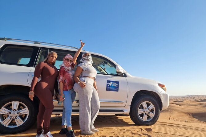 Dubai Red Dunes with Sandboarding, Camel Ride, Falcon & VIP Camp - Bedouin-style VIP camp: BBQ dinner plus real entertainment