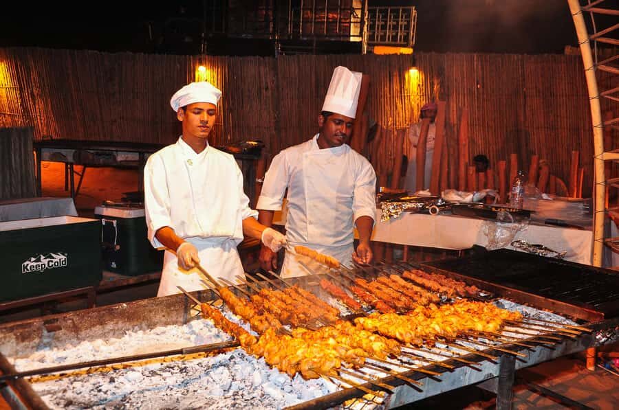 Dubai: Safari, Quad Bike, Camel Ride, and Buffet Dinner - Red Dune Dune Bashing and Sandboarding: Where the Adrenaline Hits