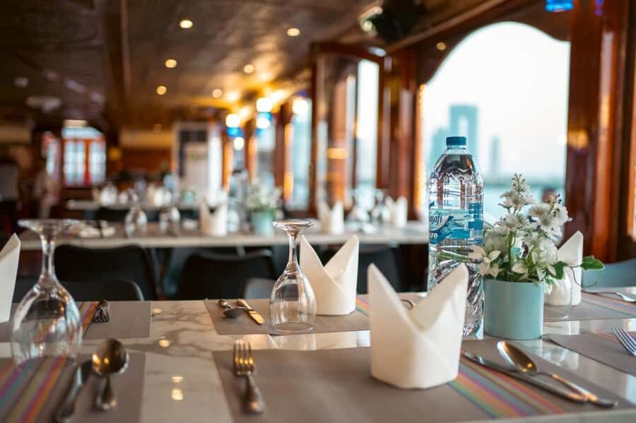 Dubai: Scenic Dhow Cruise with Buffet Dinner and Live Shows - The Views: Old Souk Area, Dubai Creek Tower, and City Lights at Sunset