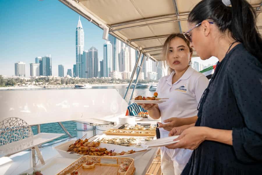 Dubai: Sunset & Night Cruise with Bites and Drinks - Key highlights you’ll notice fast