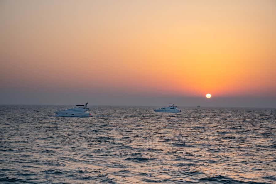 Dubai: Sunset & Night Cruise with Bites and Drinks - Comfort and boat vibe: shade upstairs, A/C downstairs