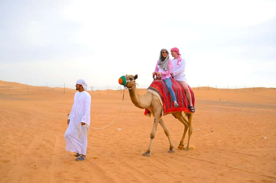 Dubai: Tour with BBQ Dinner, Camel Ride, & Traditional Show - Key highlights at a glance