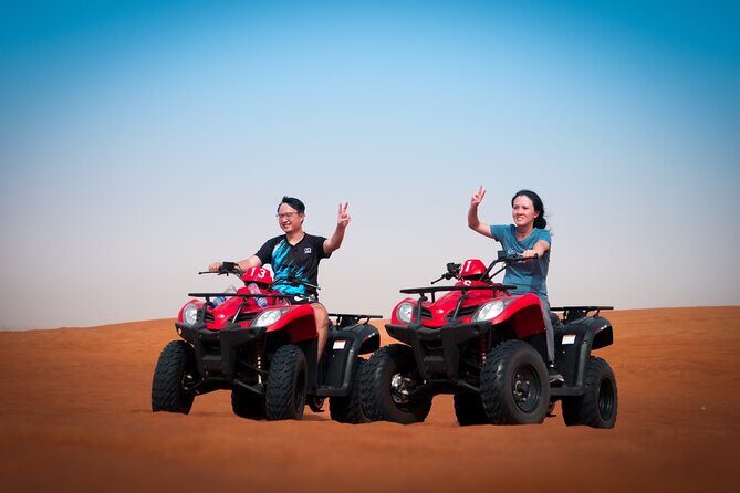 Evening Quad Bike, Desert Safari in Dubai , BBQ Dinner and Shows - Quad biking in a fenced desert: control first, then chaos