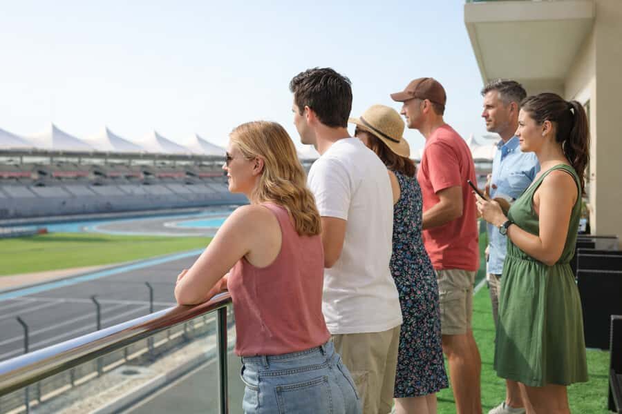 From Dubai: Abu Dhabi Day Tour with Ferrari World Ticket - Yas Marina Circuit photo stop before Ferrari World