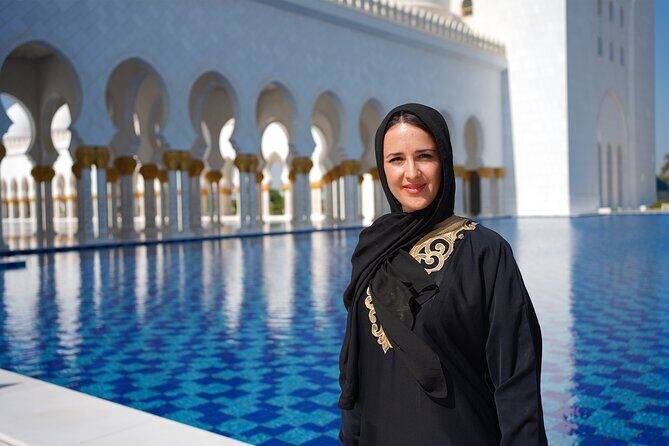 From Dubai: Abu Dhabi Sheikh Zayed Grand Mosque Guided Tour - The main interior highlights: carpet, chandelier, Swarovski glass, and calligraphy