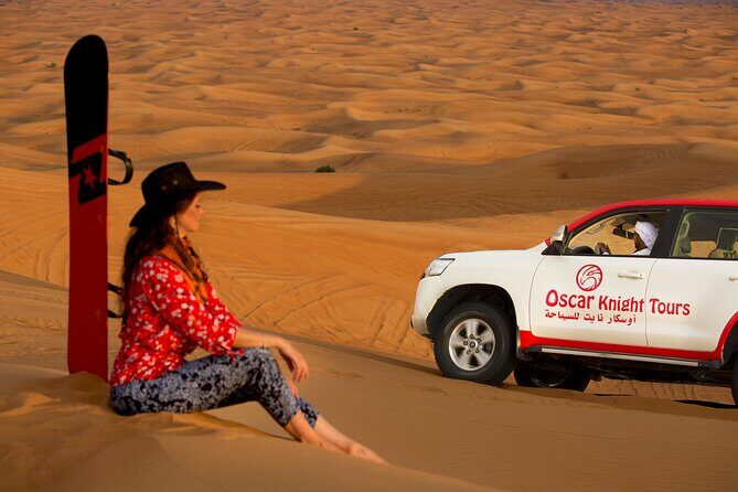 High Red Dunes with Camel Ride, Sandboarding, Falcon Show and VIP BBQ Dinner - Dune Bashing in Lahbab: Thrill Time With a Real Driver