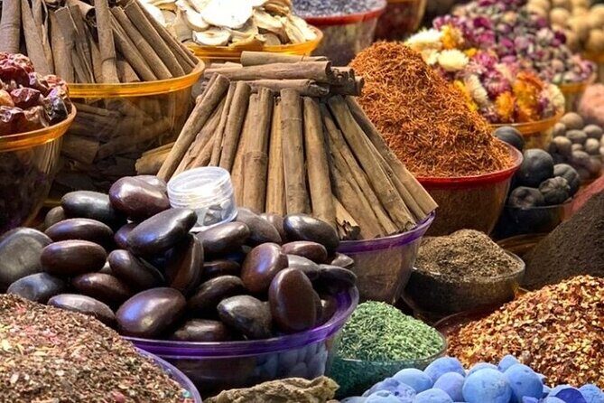 Old Dubai tour: Local Market, Tasting, Dubai creek with Abra ride - Old Souk to Abra Station: Where Shopping Feels Like Daily Life