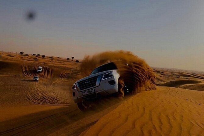Private Evening Red Sand Desert Safari with BBQ Dinner - Desert Camp Welcome: Coffee, Dates, and the Pace of the Evening